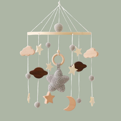 beau mobile lit bébé étoile grise au centre