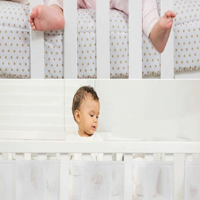 bébé au lit avec tour de lit respirant