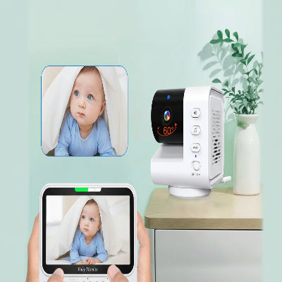 camera bébé avec bébé sous couverture