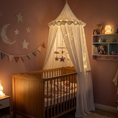 Ciel de lit bébé blanc illuminné