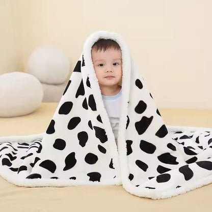 enfant assis couverture bébé noir blanc