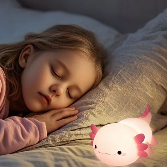 fillette endormie avec veilleuse bébé rose