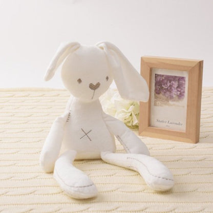 joli doudou bébé lapin blanc
