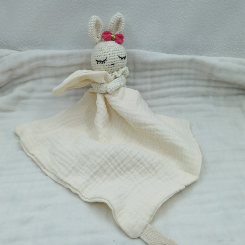 joli petit  doudou lapin blanc