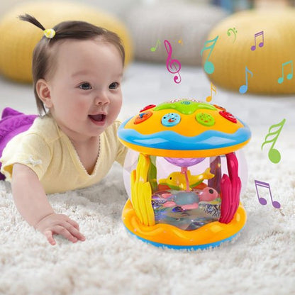 jolie veilleuse musicale bébé aquarium
