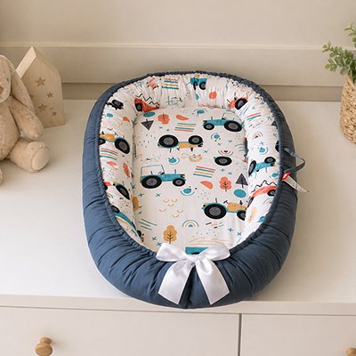 Réducteur de lit bébé tracteur 