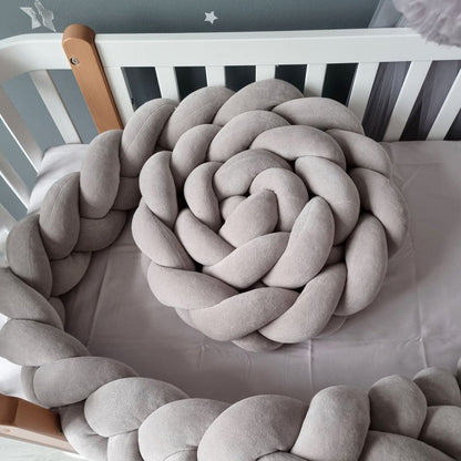 tresse de lit bebe grise enroulee